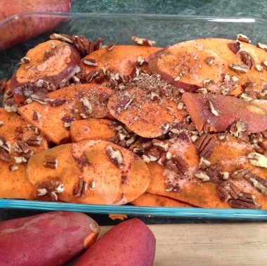 Pecan Baked Sweet Potatoes in glass pyrex dish ready to go into the oven