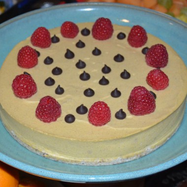 Pumpkin "Cheese" cake decorated with raspberries and chocolate chips