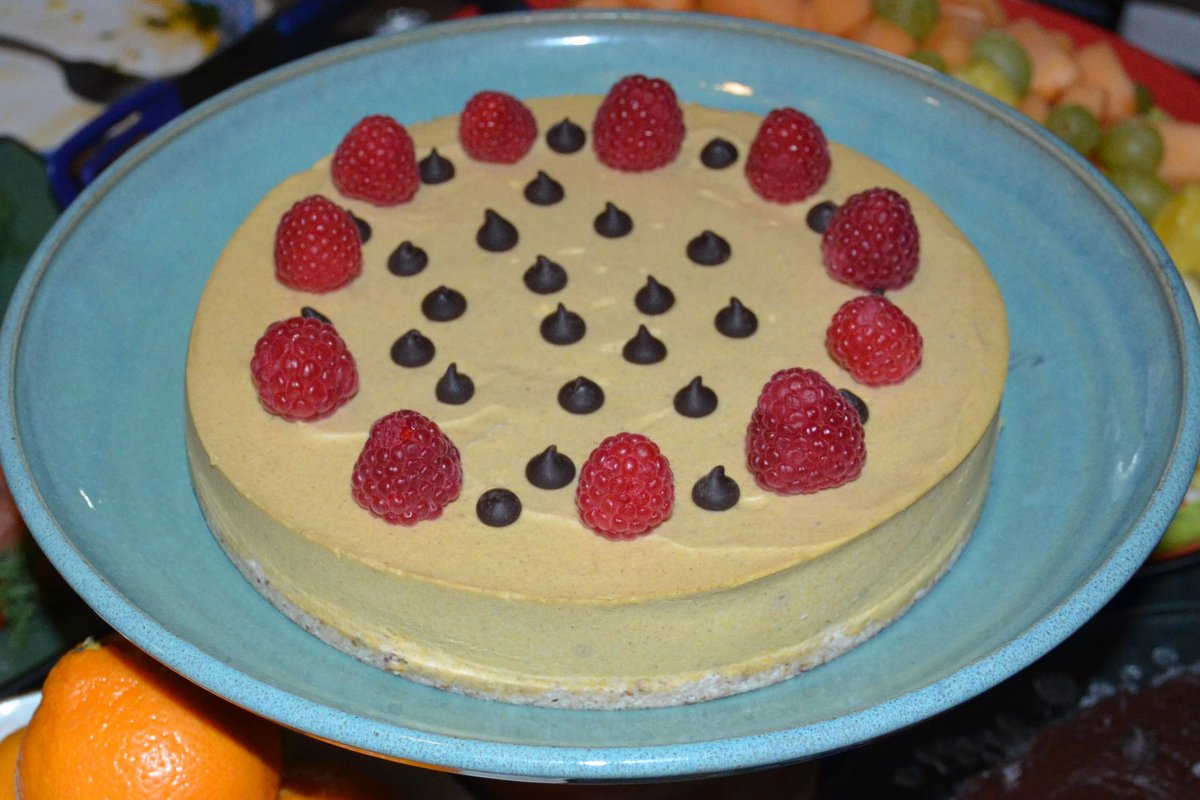 Pumpkin "Cheese" cake decorated with raspberries and chocolate chips