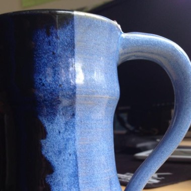 Blue Mug with a cold killer hot drink